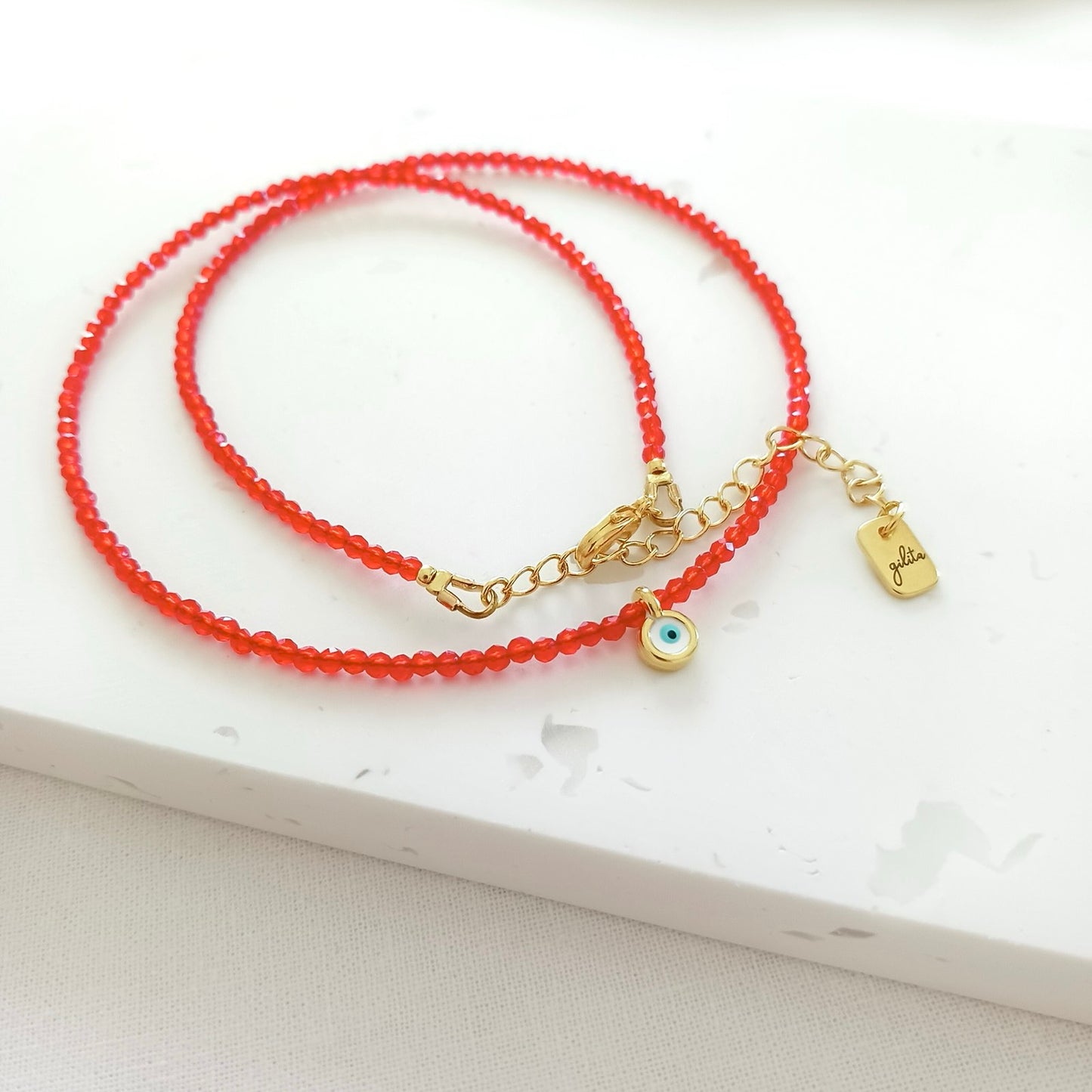 Κολιέ με κόκκινα κρυσταλλάκια και ματάκι